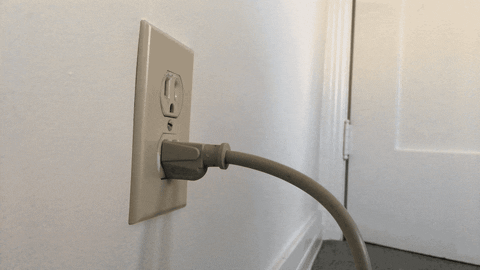 An animated hand comes out of a plug in the wall to remove a cord plugged into the other outlet.